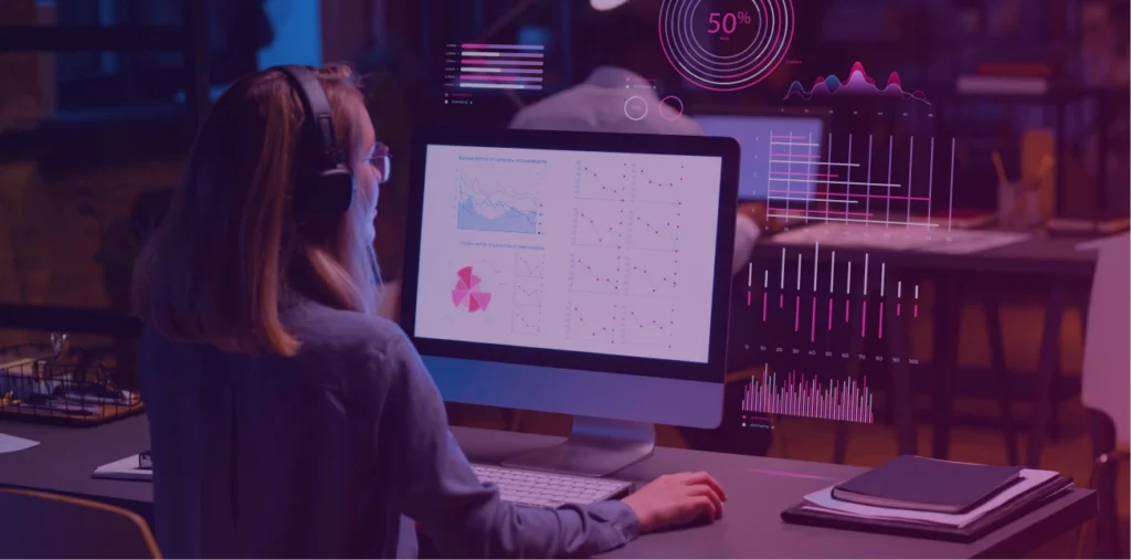 Women on computer with holograms of graphs and disgrams